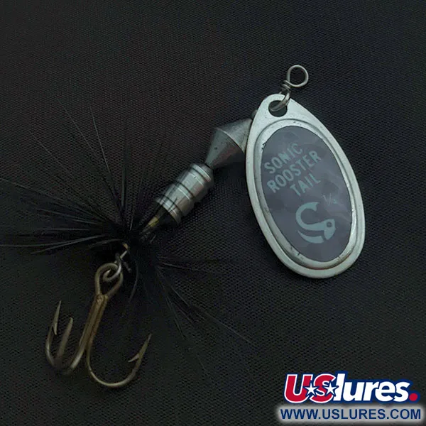 Vintage  Yakima Bait Worden’s Sonic Rooster Tail, 1/4oz silver/black mylar spinning lure #21078